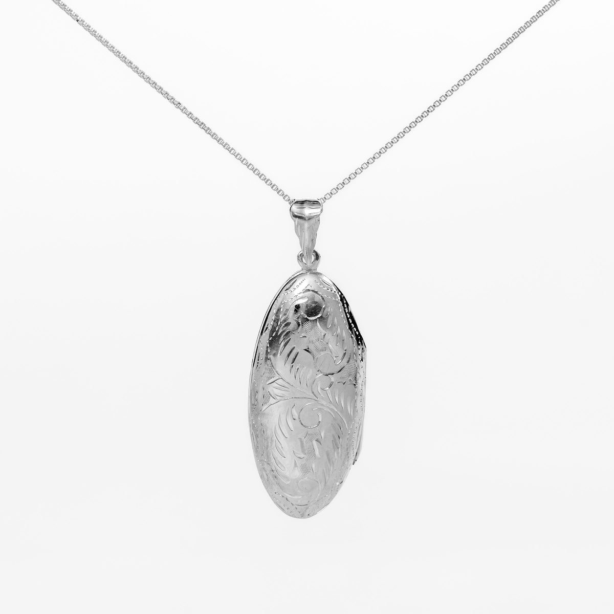 Oval Engraved Vault Locket